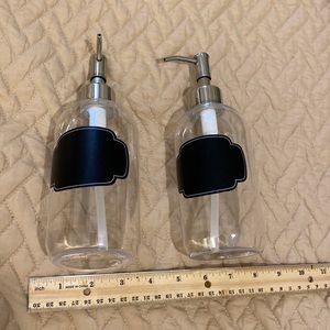 2 matching plastic liquid soap dispensers